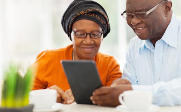 Older couple using tablet