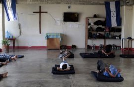 Central United states migrants watch television within Hogar de la Misericordia (Residence of Mercy) migrants refuge in Arriaga in August 2014. Picture by Jorge Dan Lopez/Reuters