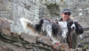 Pete using Ollie within the ruins of an Irish castle while residence sitting