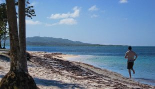 running on an attractive beach whenever you travel