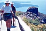 Trekking poles assist seniors on walking and hiking holidays in Greece.